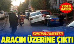 Kontrolü kaybetti, park halindeki aracın üzerine çıktı (VİDEO HABER)