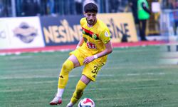 Siyah-kırmızılı formayla ilk sınav