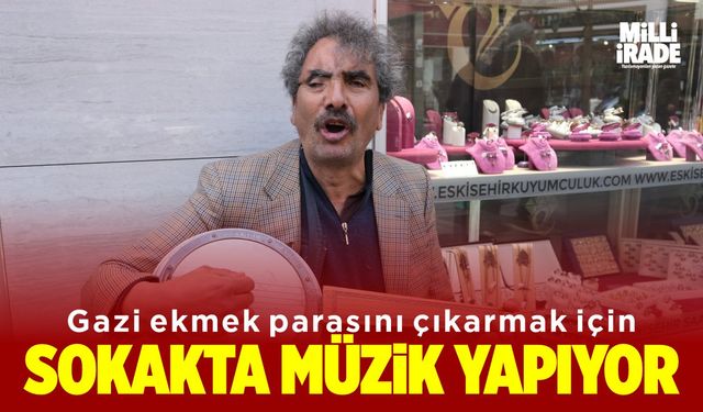 Asker gazisi ekmek parasını için sokakta müzik yapıyor