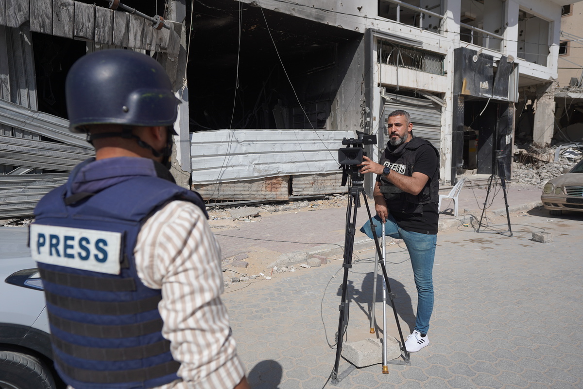 A A 20250503 37832079 37832065 G A Z A J O U R N A L I S T S T R Y T O R E P O R T T H E T R U T H A T T H E C O S T O F T H E I R L I V E S 1