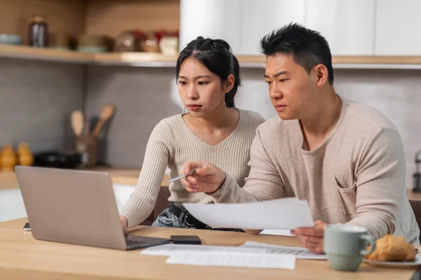 Stock Photo Concentrated Korean Middle Aged Husband Young Wife Sitting Kitchen Table